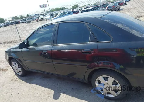 2004 Suzuki Forenza S из США, поврежденный, VIN KL5JD52Z44967910